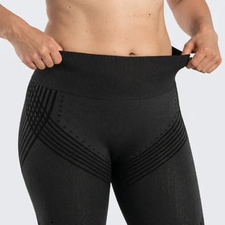 Le legging vu de dos, de la cheville à la ceinture